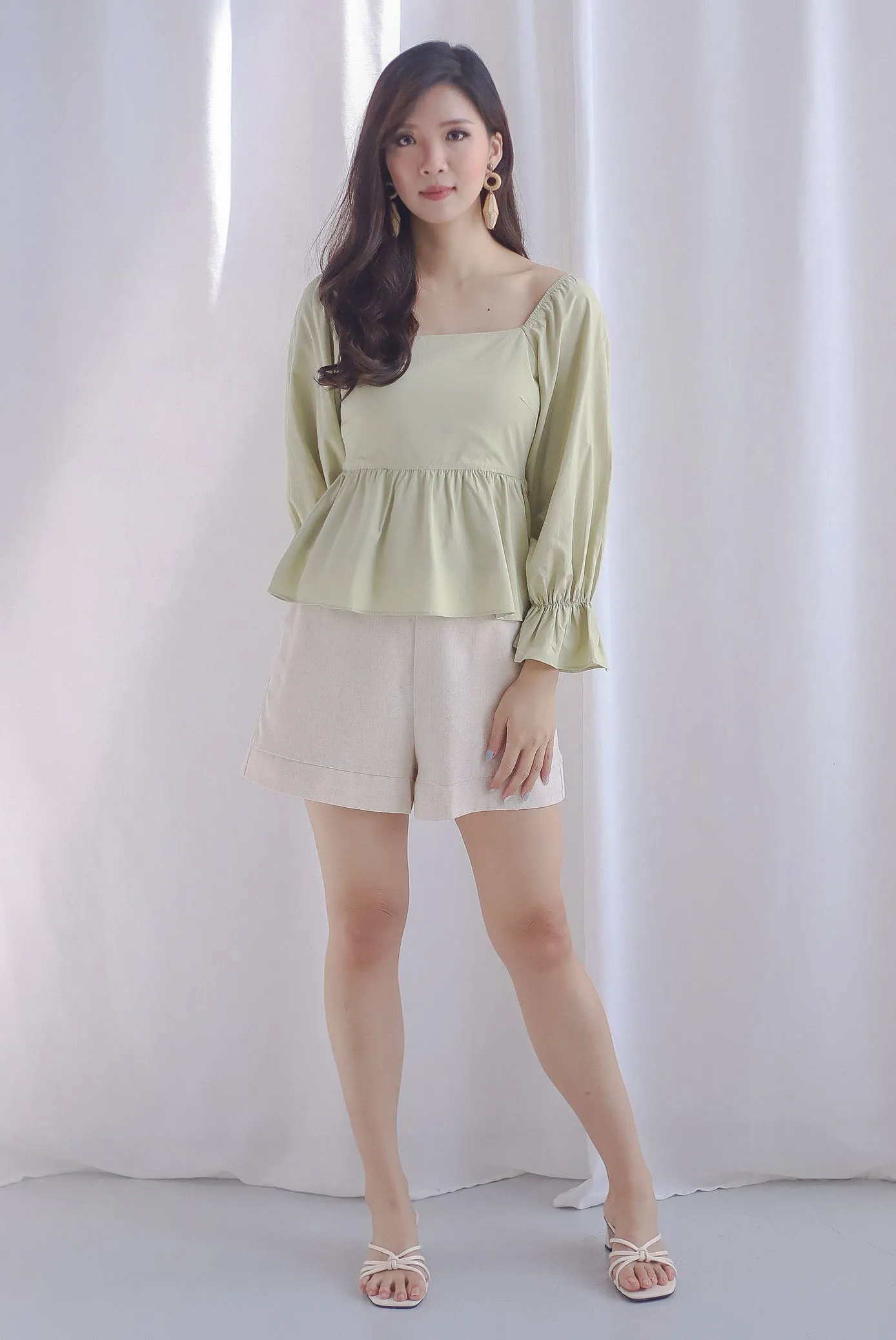 Santino Puffy Sleeve Square Neckline Peplum Top In Pistachio