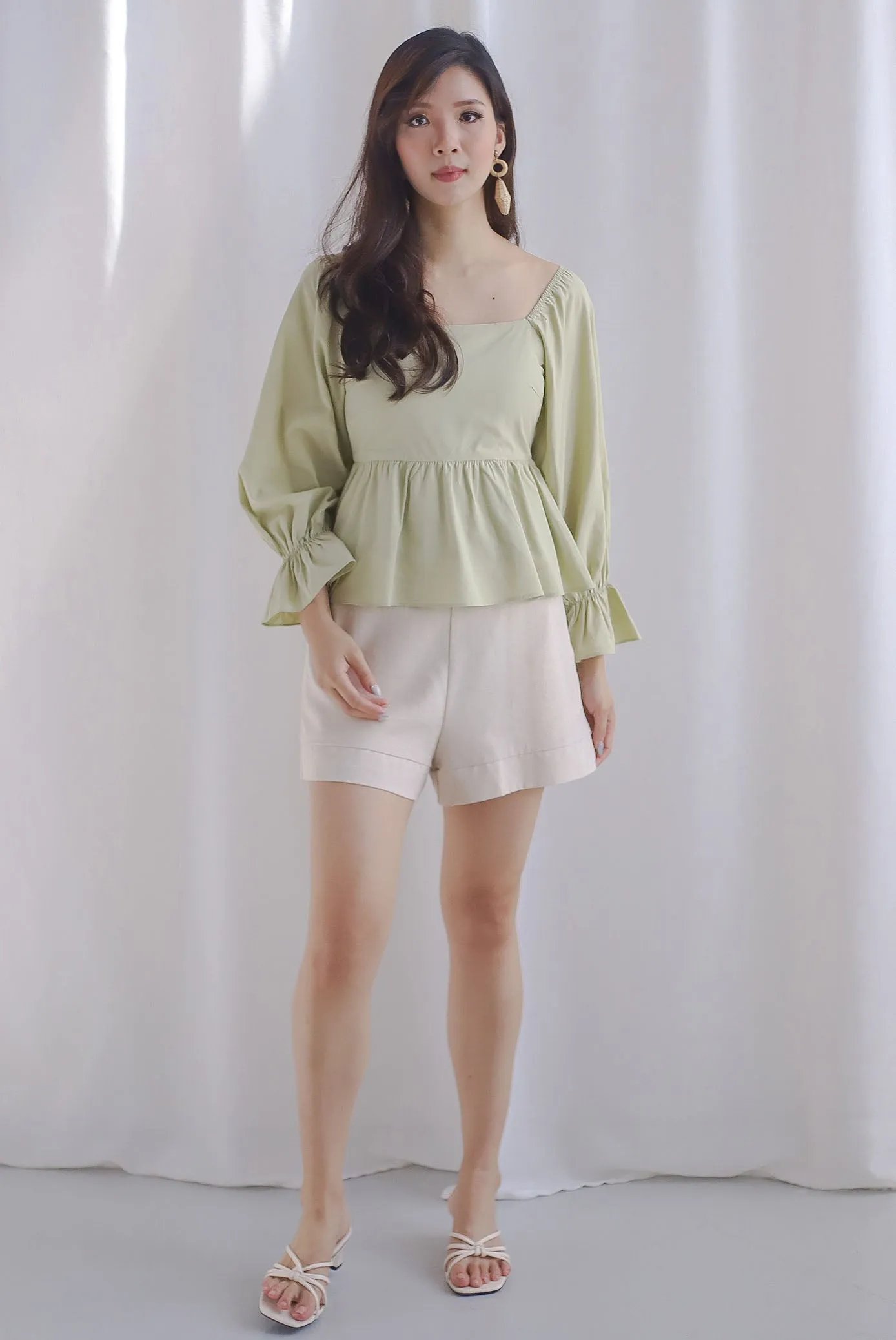 Santino Puffy Sleeve Square Neckline Peplum Top In Pistachio