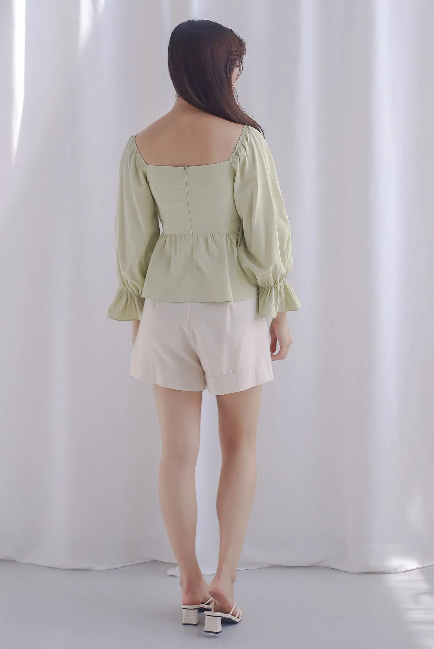 Santino Puffy Sleeve Square Neckline Peplum Top In Pistachio
